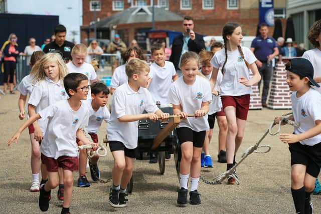 A field gun crew from Meon Junior School, Portsmouth. Armed Forces Day at Portsmouth Historic Dockyard
Picture: Chris Moorhouse (jpns 250622-17)
