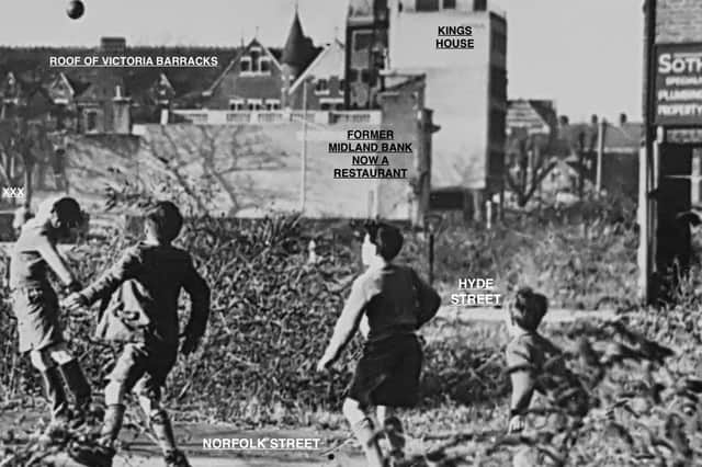 We now know the lads were having a kickabout on Norfolk Street, Southsea. The 'XXX' on the left is a man riding a bike along King's Road.