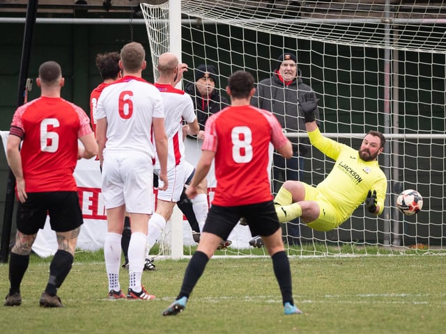 Horndean keeper Cameron Scott is beaten again. Picture: Keith Woodland