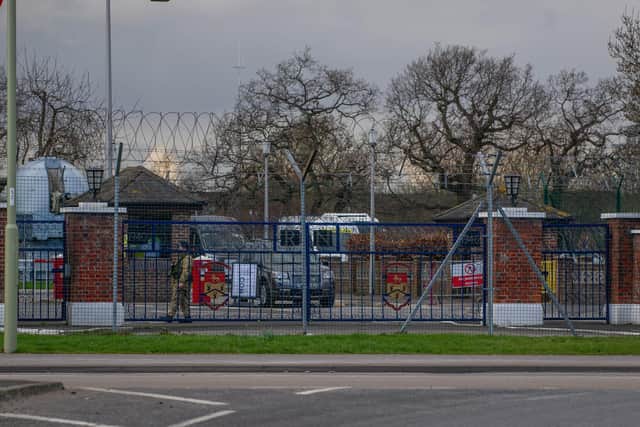 HMS Collingwood, in Fareham where workers at the base have warned coronavirus concerns were being ignored by the navy. Pictured is the base entrance as a guard walks past it.
Picture: Habibur Rahman
