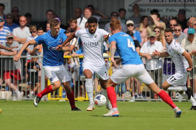 Hawks' Jonah Ayunga and Pompey's Sean Raggett in action during the clubs' annual pre-season friendly last year. The teams could be playing again next month ahead of Hawks' National League South play-off semi-final. Pic: Dave Haines.


Hawks v Pompey - Pre-season Friendly, Westleigh Park, Havant England on 10 September 2016. Photo by Dave Haines/Portsmouth News