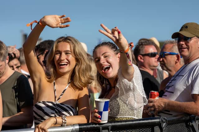 Crowds enjoying Anna Calvi performing on the Common Stage 
Photos by Alex Shute