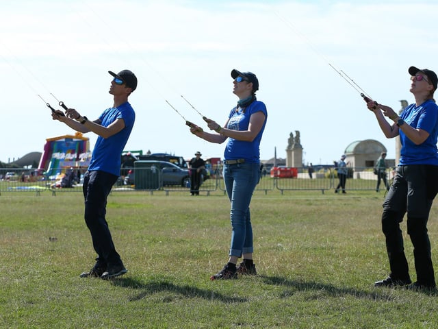 Stephan Friers, Joanna Chaperon and Ingeborg Aarts expertly handle their kites.Picture: Chris  Moorhouse (270724-01)
