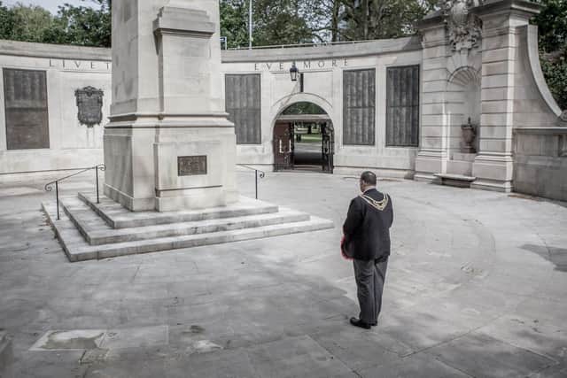 Lord Mayor David Fuller laying a wreath alone at the war memorial in Guildhall Square at 11am to remember all the lives lost during WW2 on Friday 8 May 2020. Picture: Habibur Rahman