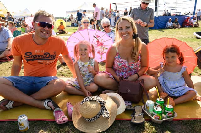 Pictured is: Anthony and Carly Read enjoying the day with their family.
Picture: Keith Woodland