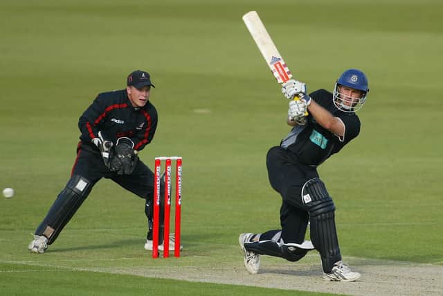 Hampshire's Simon Katich hits out during the first ever T20 game against Sussex at The Rose Bowl in June 2003. Tim Ambrose is the wicket-keeper who later top scored for the visitors in their five-run loss. Photo by Mike Hewitt/Getty Images.