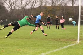 Waterlooville Wanderers Reserves' George Howden scores one of his four goals in an Adelaide Cup second round tie against Milton Park Rangers. Picture by Kevin Shipp