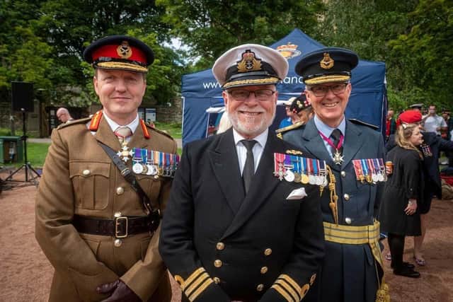 Cdr Hawkins at an Armed Forces Day event in Edinburgh with Army and RAF colleagues. Picture: Royal Navy.