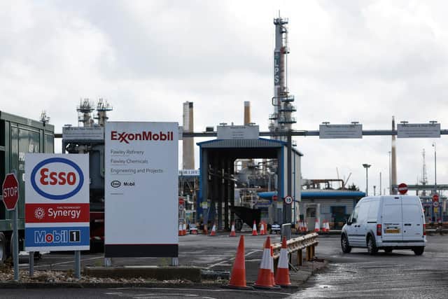 The ExxonMobil Esso Oil is pictured in Fawley  (Photo by Adrian DENNIS / AFP) (Photo by ADRIAN DENNIS/AFP via Getty Images)