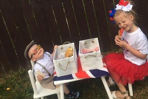 Jude Dixon, nearly two, and big sister Amelia Baird, seven, dining in style in Hylton Lane.