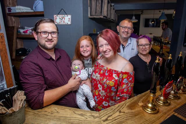 Oliver and Sara Pollard-Dambach with their children, Chloe-Louise and Olivia-Rose 17 weeks and Oliver's parents, Chris and Rosie Dambach.
Picture: Habibur Rahman