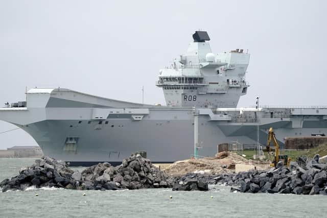 The Royal Navy Aircraft carrier HMS Queen Elizabeth passes Southsea Castle as she leaves Portsmouth harbour to deploy to northern Europe with Nato allies on Thursday November 10, 2022. Photo: Andrew Matthews/PA Wire