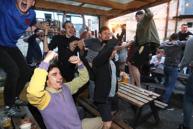 Fans at the Milton Arms in Portsmouth watching England play Denmark in the Euro 2020 semi-finals at Wembley.
Picture: Sam Stephenson