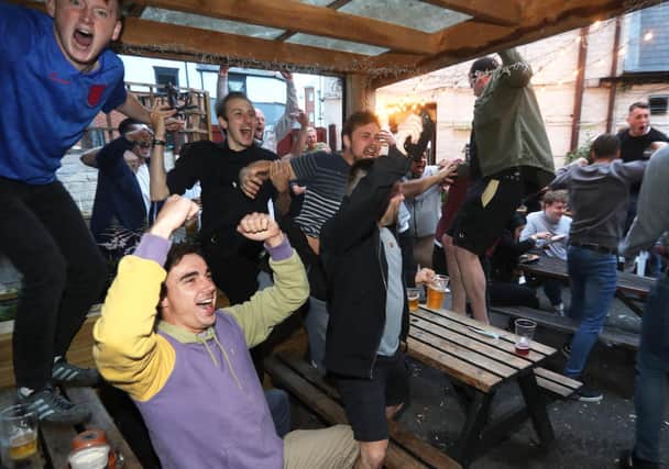 Fans at the Milton Arms in Portsmouth watching England play Denmark in the Euro 2020 semi-finals at Wembley.
Picture: Sam Stephenson