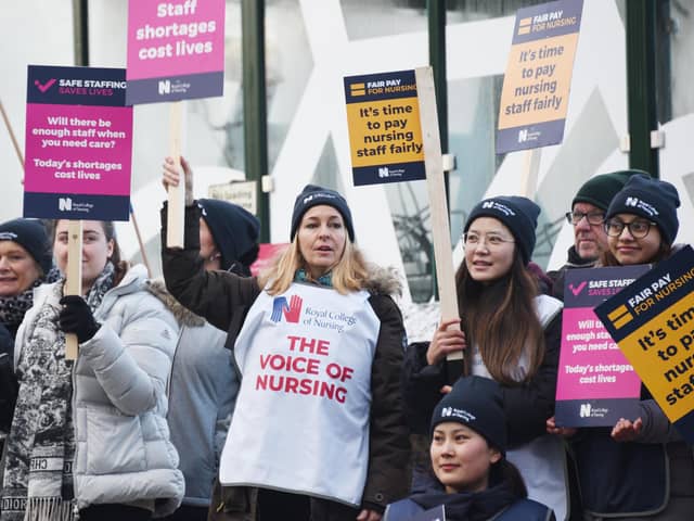 Nurses braving freezing temperatures to form a picket line.