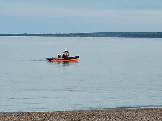 Lifeboat teams seen during a training drill in Southsea.