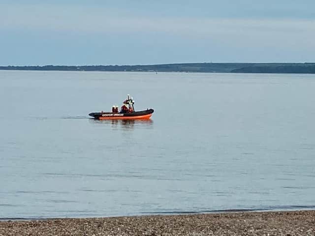 Lifeboat teams seen during a training drill in Southsea.