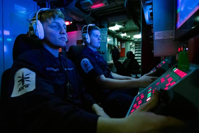 Pictured: Ships 'Gunners' (left to right) Darach Winstanley-Jones and James Hearn monitor a screen during an air defence exercise on HMS Lancaster.

Credit: LPhot Dan Rosenbaum, HMS Lancaster