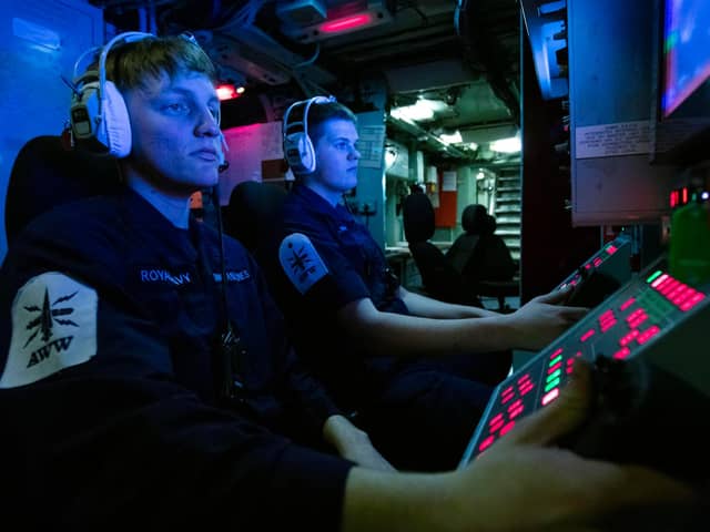 Pictured: Ships 'Gunners' (left to right) Darach Winstanley-Jones and James Hearn monitor a screen during an air defence exercise on HMS Lancaster.

Credit: LPhot Dan Rosenbaum, HMS Lancaster
