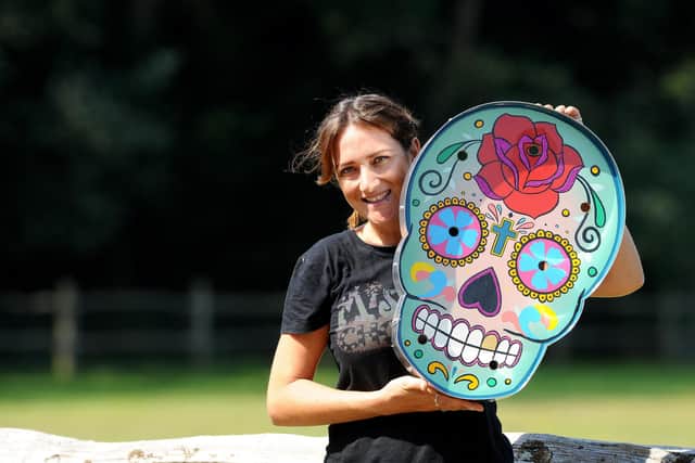Nina Burras from Hayling Island, and owner of Missing Chopper with a Mexican Day of the Dead skull Picture: Sarah Standing (260620-5043)