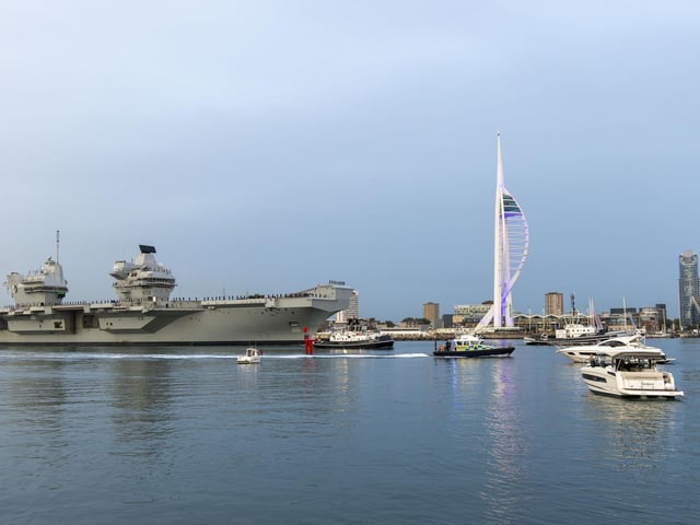HMS Queen Elizabeth is leading the carrier strike group and head to the North Sea on Friday.
