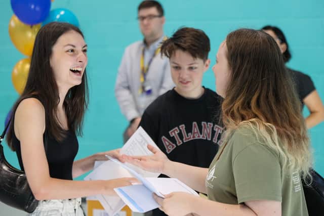 Students celebrate their A-level results at UTC Portsmouth.