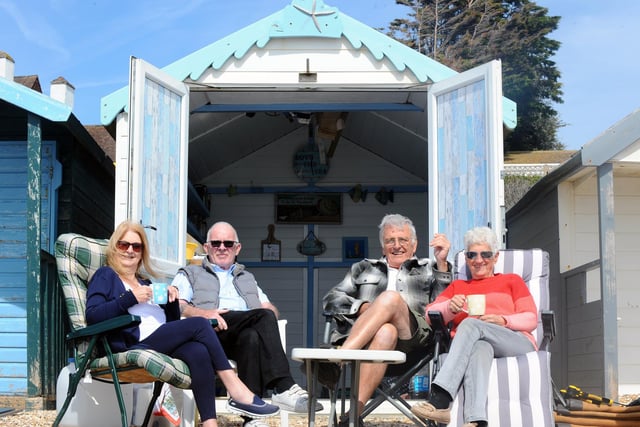 From left, Glynis, 70, and Richard Pond, 69, from Southampton with Paul, 74, and Sheila Hayward, 73, from Locks Heath, enjoying their beach hut they have owned for more than 40 years (180422-1081)