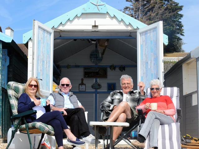 From left, Glynis, 70, and Richard Pond, 69, from Southampton with Paul, 74, and Sheila Hayward, 73, from Locks Heath, enjoying their beach hut they have owned for more than 40 years (180422-1081)