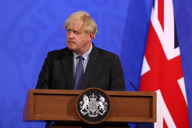 Britain's Prime Minister Boris Johnson speaks during a Covid-19 pandemic virtual press conference inside the Downing Street Briefing Room on June 14, 2021 in London, England. The  Prime Minister confirms a four-week delay to the lifting of all restrictions in England beyond 21 June. (Photo by WPA Pool/Getty Images)