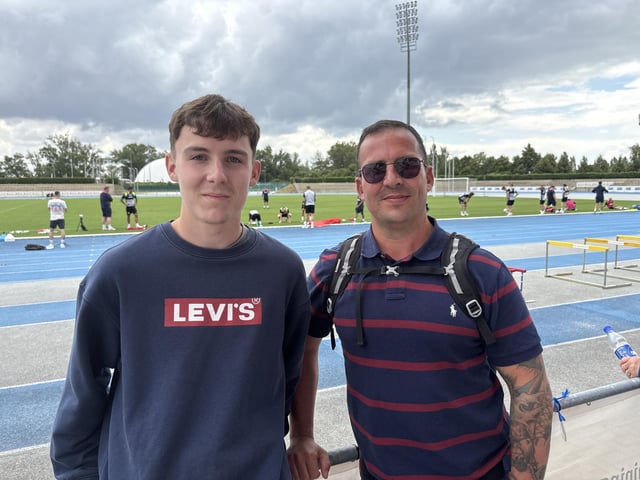 Calum Roberts, aged 18 from Waterlooville, and Keith Roberts, aged 45 from Waterlooville, at Pompey's open training session at the X-Bionic Sphere Sports Centre in Šamorín, Slovakia.