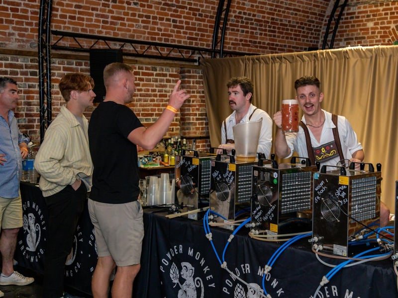 Busy bar staff at the Powder Monkey Oktoberfest in Gosport. Picture: Mike Cooter (011023)