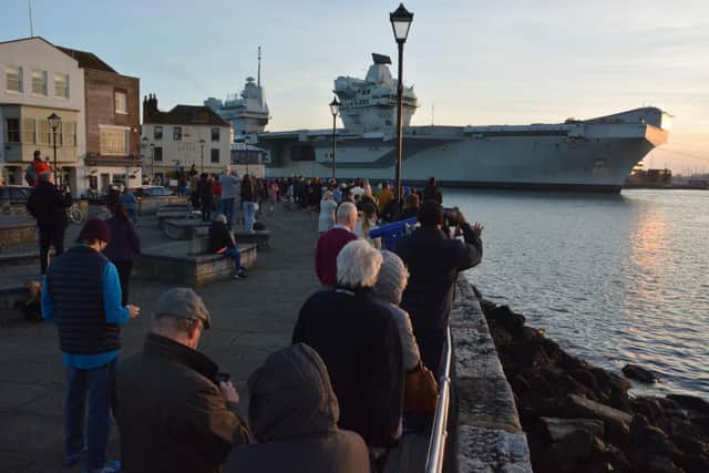 HMS Queen Elizabeth returns to Portsmouth Naval Base following sea trials and a visit to western Scotland. Issue date: Monday March 22, 2021. Picture: Ben Mitchell/PA Wire