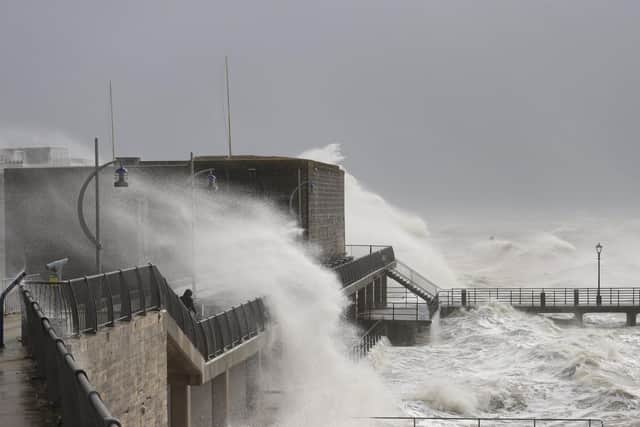 Pictured are the waves caused by Storm Eunice in 2022. Photos by Alex Shute