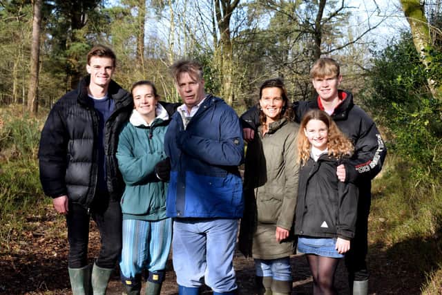 Caroline Blatter, third from right, with husband Andrew (centre) who has frontotemporal dementia and now in a care home, with their children. Photo by Marie Mangan