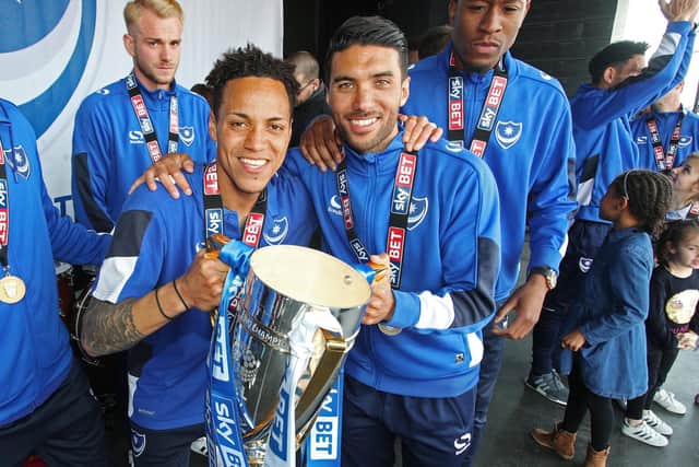 Danny Rose, pictured with Kyle Bennett, claimed the League Two title in his first season at Fratton Park in 2016-17. Picture: Joe Pepler