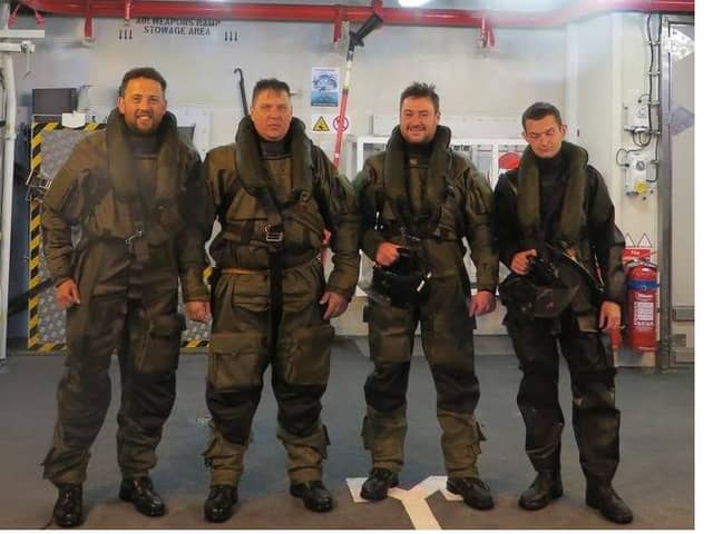 The sailors from HMS Duncan scrambled to rescue the stricken yacht.