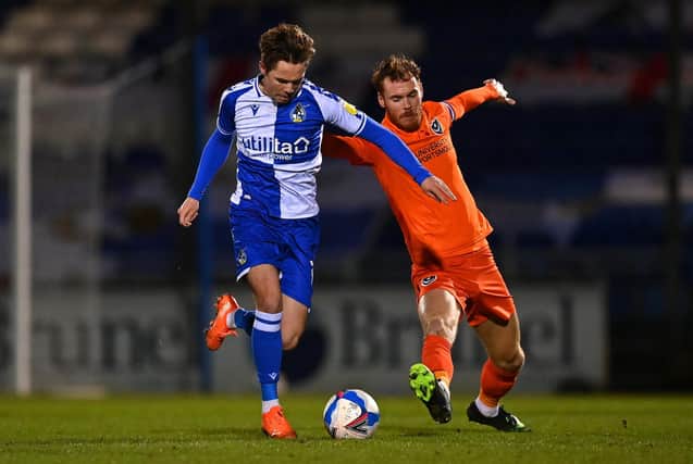 Tom Naylor in action against Bristol Rovers' San Nicholson (Photo by Dan Mullan/Getty Images)