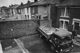 Southsea’s 'Berlin Wall' demolished. Who remembers the wall that divided Morley Road, Southsea?  Picture: The News archive.