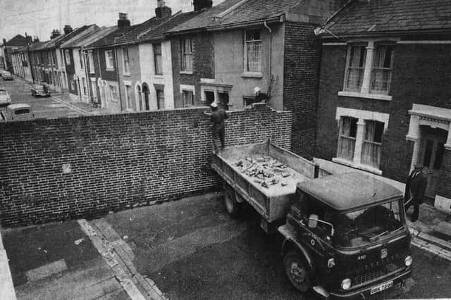 Southsea’s 'Berlin Wall' demolished. Who remembers the wall that divided Morley Road, Southsea?  Picture: The News archive.