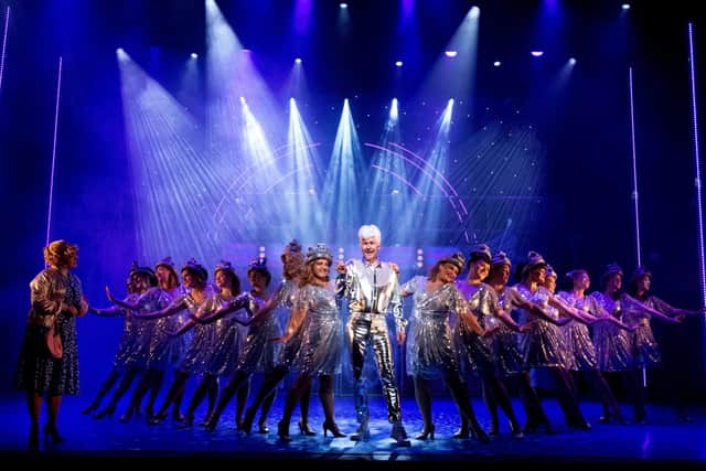 Stuart Warner as Teen Angel with the ensemble