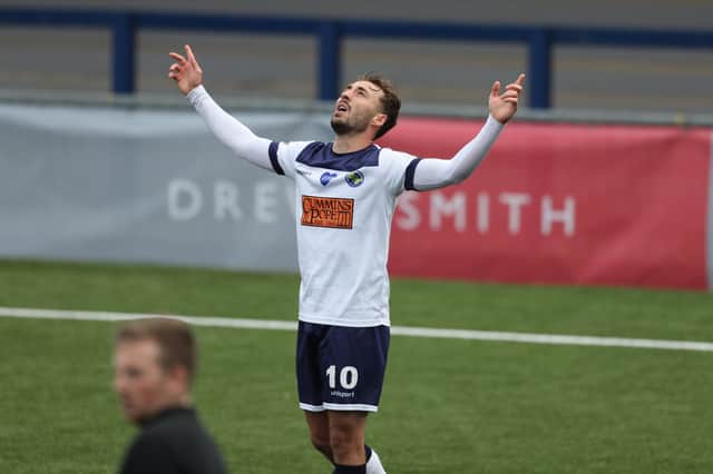 Joe Iaciofano celebrates after scoring one of his two goals on his National League South debut for Hawks against Maidstone last October. Picture by Dave Haines.