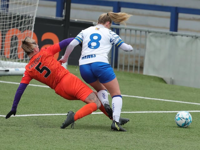 Hawks' Jodie Burchell is tackled by Gosport Falcons' Danielle Clark. Picture: Dave Haines