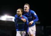 Marcus Harness and Ronan Curtis celebrate during Pompey's EFL Trophy success over Exeter in February 2020. But Wembley selection could be hinder by regulations. Picture: Joe Pepler
