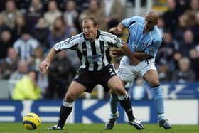 Zesh Rehman tangles with Newcastle's Alan Shearer during a Premier League game in November 2004. Picture: Matthew Lewis/Getty Images