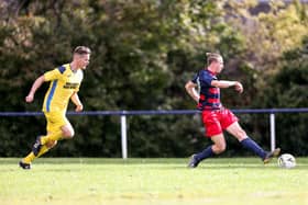 Zak Willett, right, about to score one of his four goals for Paulsgrove in the 7-2 thrashing of Liphook. Picture: Chris Moorhouse