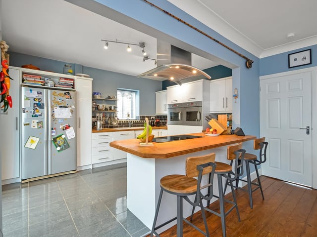 The kitchen and breakfast bar