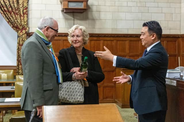 Peter and Sandie Adams from Langstone receive their wedding anniversary gift from Havant MP Alan Mak
