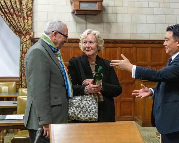 Peter and Sandie Adams from Langstone receive their wedding anniversary gift from Havant MP Alan Mak