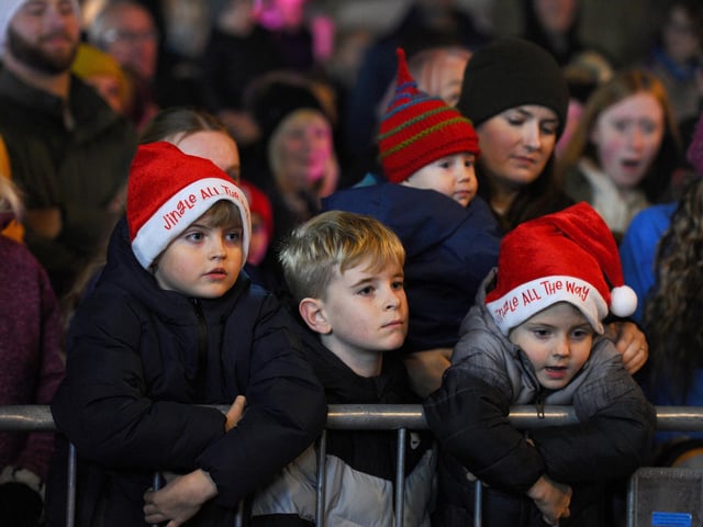 Friends and families enjoyed a festive evening with the Christmas lights being turned on in Portchester.  Picture: Sarah Standing (291124-9691)