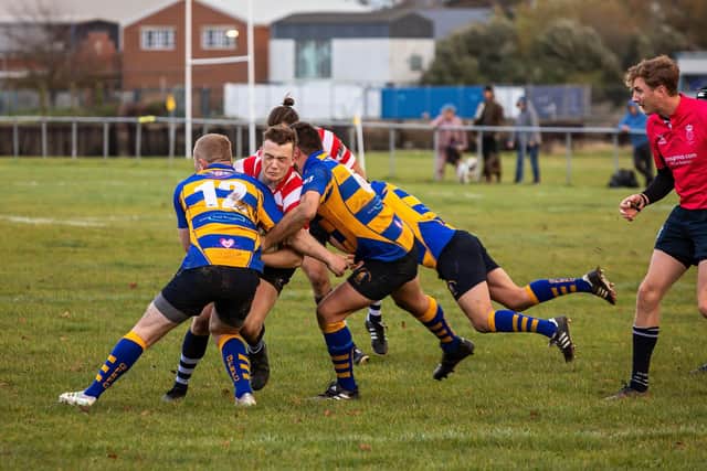 Havant's Harry Rabjohn is tackled. Picture: Mike Cooter